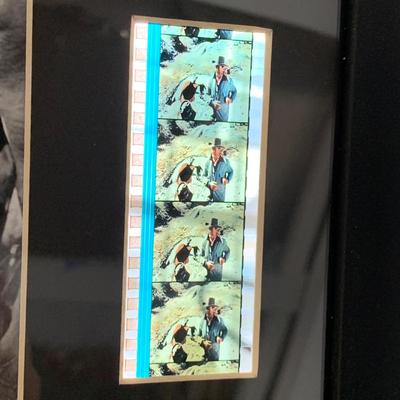 LOT 92 M: Framed John Wayne Collection: First Day Issue Stagecoach Stamp, Limited Edition Film Cells, Rio Bravo "Dynamite"...