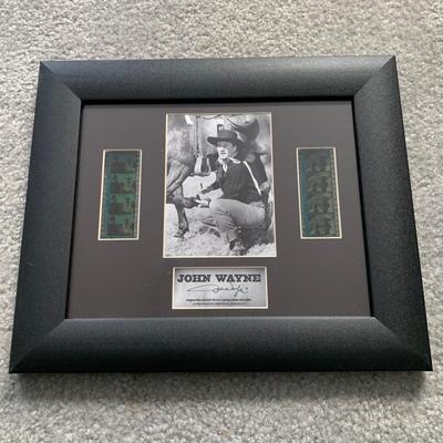 LOT 92 M: Framed John Wayne Collection: First Day Issue Stagecoach Stamp, Limited Edition Film Cells, Rio Bravo "Dynamite"...