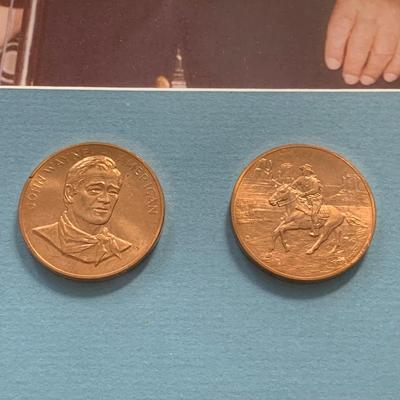 LOT 92 M: Framed John Wayne Collection: First Day Issue Stagecoach Stamp, Limited Edition Film Cells, Rio Bravo "Dynamite"...