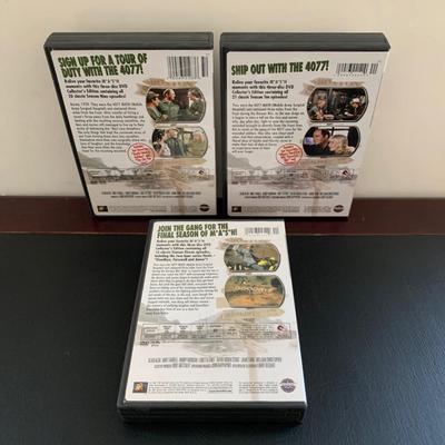 LOT 94 M: M*A*S*H Collection; Coffee Mug, Iron On Patch, DVD's Season 1 - 11, & Framed Infograph