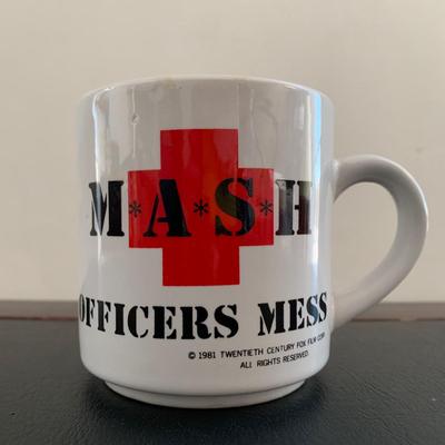 LOT 94 M: M*A*S*H Collection; Coffee Mug, Iron On Patch, DVD's Season 1 - 11, & Framed Infograph