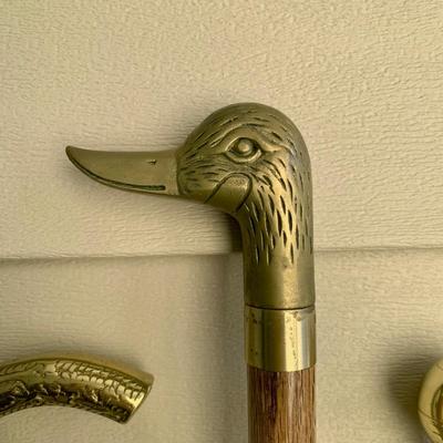 LOT 95 M: Collection of Brass Handled Walking Canes