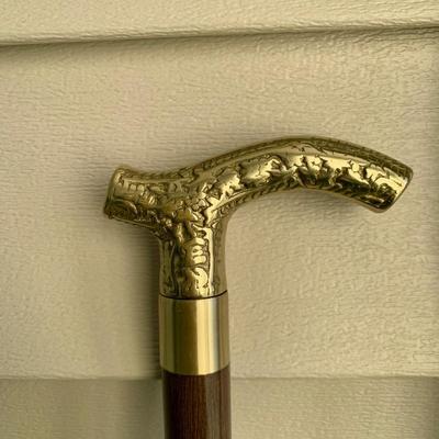 LOT 95 M: Collection of Brass Handled Walking Canes