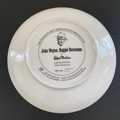 LOT 98 M: John Wayne Limited Edition Porcelain Plate Collection; Franklin Mint by Robert Tomenbaum; "The Legend Lives On",...
