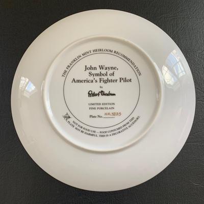 LOT 98 M: John Wayne Limited Edition Porcelain Plate Collection; Franklin Mint by Robert Tomenbaum; "The Legend Lives On",...