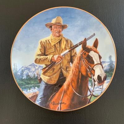 LOT 98 M: John Wayne Limited Edition Porcelain Plate Collection; Franklin Mint by Robert Tomenbaum; "The Legend Lives On",...