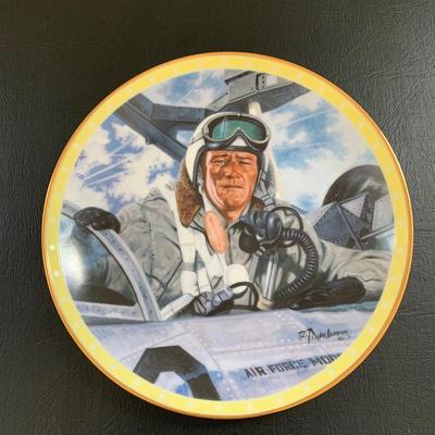 LOT 98 M: John Wayne Limited Edition Porcelain Plate Collection; Franklin Mint by Robert Tomenbaum; "The Legend Lives On",...