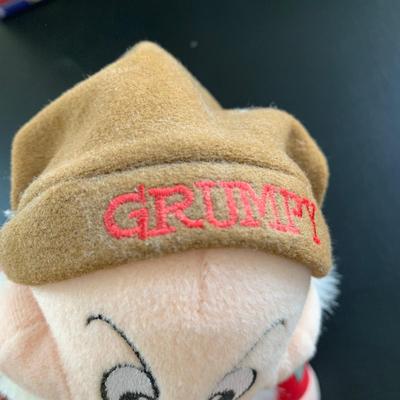 LOT 103 M: Disney Collection: Keychains, Postcards, CD, Playing Cards, Grumpy & Figment Stuffed Animals, DVD's, & More