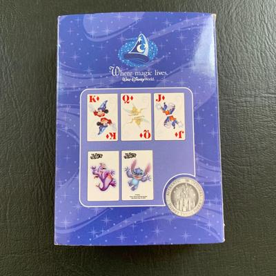 LOT 103 M: Disney Collection: Keychains, Postcards, CD, Playing Cards, Grumpy & Figment Stuffed Animals, DVD's, & More