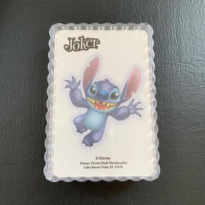 LOT 103 M: Disney Collection: Keychains, Postcards, CD, Playing Cards, Grumpy & Figment Stuffed Animals, DVD's, & More