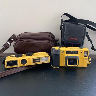 LOT 104 M: Minolta Underwater Cameras w/ Cases: Weathermatic Dual 35 Model #02354983 & Weathermatic A 110 Model #1040685
