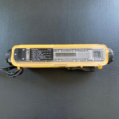 LOT 104 M: Minolta Underwater Cameras w/ Cases: Weathermatic Dual 35 Model #02354983 & Weathermatic A 110 Model #1040685