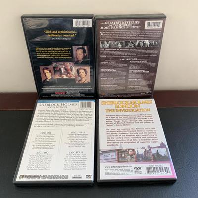 LOT 116 M: Sherlock Holmes Collection: DVDs, Book, Coffee Mugs, Desk Magnifier, & More