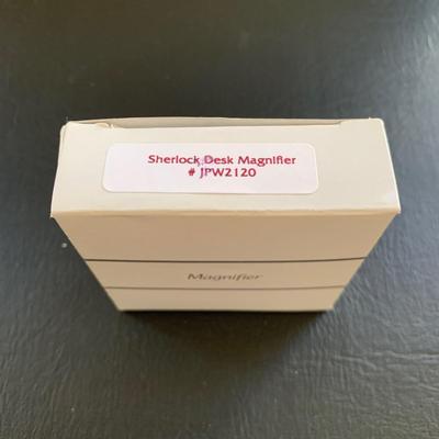 LOT 116 M: Sherlock Holmes Collection: DVDs, Book, Coffee Mugs, Desk Magnifier, & More