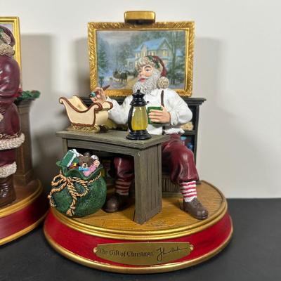 LOT 143U: The Bradford Exchange/Thomas Kinkade Light Up The Holidays Sculptures - The Gift/The Light Of Christmas