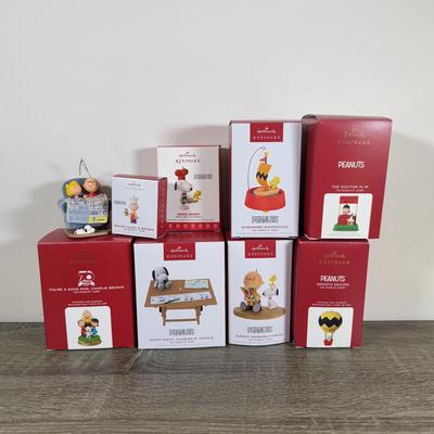 LOT 206M: Peanuts Hallmark Keepsake Ornaments - Mini Baker Charlie Brown, Baker Snoopy, 70 Year Anniversary, Windward Woodstock & More