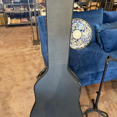 Sale Photo Thumbnail #34: The Jasmine S-35 is a beginner-level acoustic guitar with a dreadnought body type and a natural finish. It features a 6-string configuration and comes with a black gig bag for easy transport. Ideal for practice sessions, casual performances, or learning s