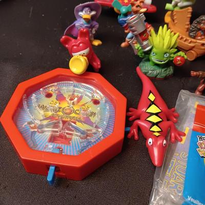 A COLLECTION OF EARLY KIDS MEAL TOYS
