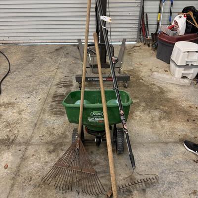 Sale Photo Thumbnail #14: INCLUDES TURF BUILDER SCOTTS SPREADER, 2 RAKES, AND A HOE