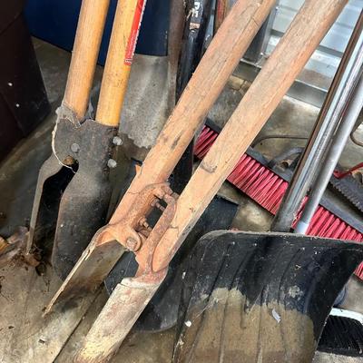 Sale Photo Thumbnail #343: GARDEN TOOL LOT, POST HOLE DIGGERS, SHOVEL, BROOMS, RAKES AS PICTURED 