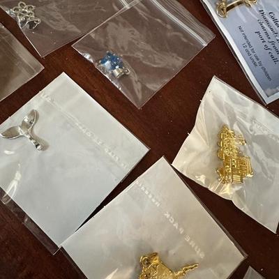 CHARM NECKALCE AND MISC CHARMS LOT