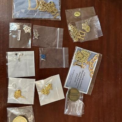 CHARM NECKALCE AND MISC CHARMS LOT