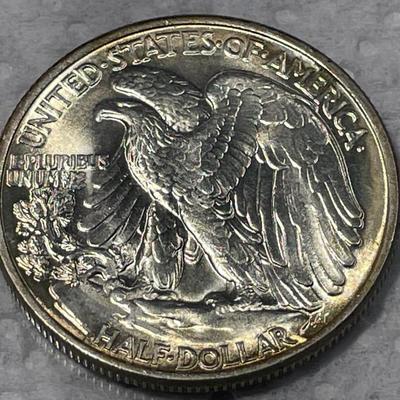1947-P Choice BU Condition w/Toned Rims Walking Liberty Silver Half Dollar as Pictured. FREE DOMESTIC SHIPPING.