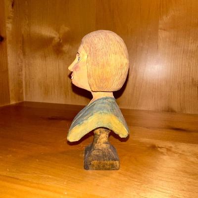 CARVING OF A LADY BUST BY AWH