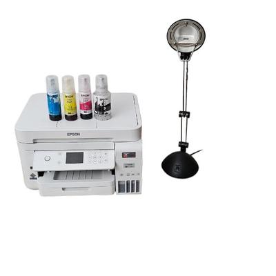 Epson Printer with Black Desk Lamp