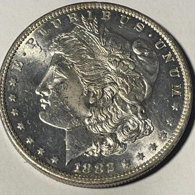 1882-0 MS63 QUALITY UN-CERTIFIED MORGAN SILVER DOLLAR AS PICTURED. FREE DOMESTIC SHIPPING.