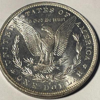 1882-0 MS63 QUALITY UN-CERTIFIED MORGAN SILVER DOLLAR AS PICTURED. FREE DOMESTIC SHIPPING.