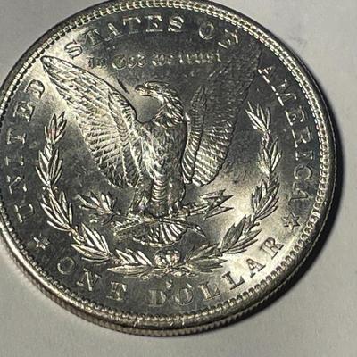 1882-0 MS64 QUALITY UN-CERTIFIED MORGAN SILVER DOLLAR AS PICTURED. FREE DOMESTIC SHIPPING.