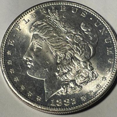 1882-0 MS64 QUALITY UN-CERTIFIED MORGAN SILVER DOLLAR AS PICTURED. FREE DOMESTIC SHIPPING.