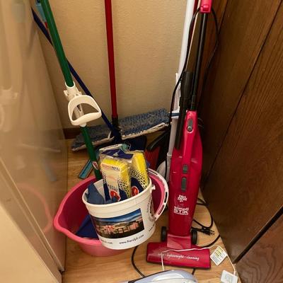 Small vacuums, brooms, & garbage can