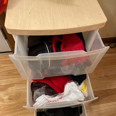 Light outdoor wear, hats, cabinet with gloves