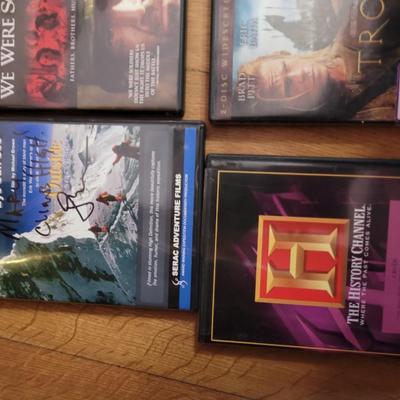 Set of 7 dvds and a new combo lock