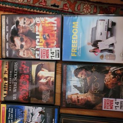Set of 7 dvds and a new combo lock