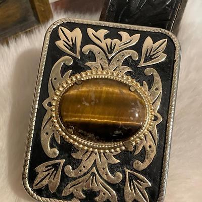 Fishing, lures, belt, buckle, and pelt