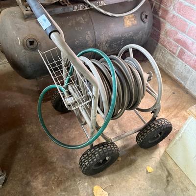 4 wheel rolling metal cart with garden hose
