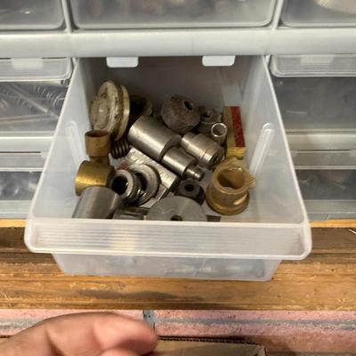 2 Plastic Boxes of assorted hardware in plastic pull out drawers