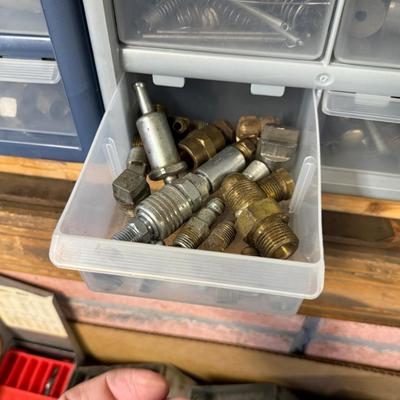 2 Plastic Boxes of assorted hardware in plastic pull out drawers