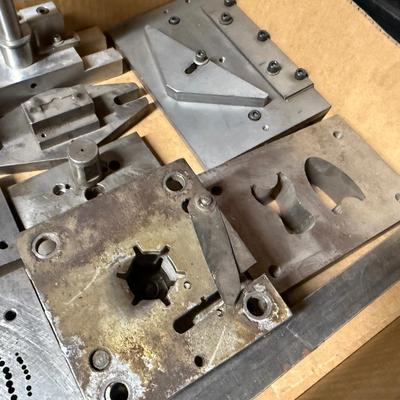 Flat box of misc. Steel milling Components ?