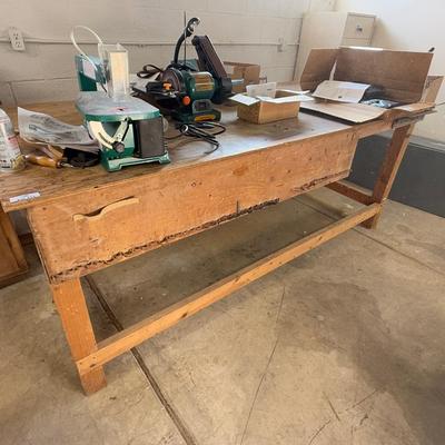 Long homemade wood work table. Approx. 4' x 8'