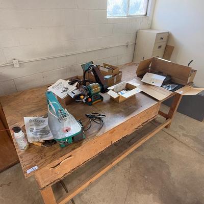 Long homemade wood work table. Approx. 4' x 8'