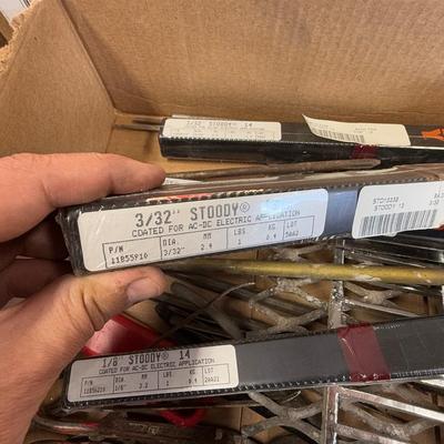 Box with Stoody Welding Rods 1/8, 3/32 & misc. metal pieces