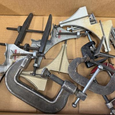 Box of various metal clamps – corner and "C"