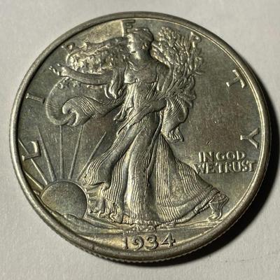 1934-P AU50 CONDITION WALKING LIBERTY SILVER HALF DOLLAR AS PICTURED. FREE DOMESTIC SHIPPING.