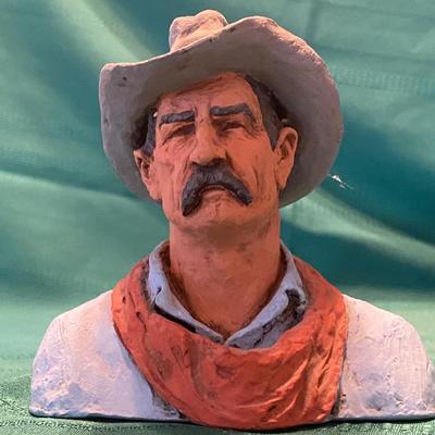 MICHAEL GARMIN COWBOY FIGURINE