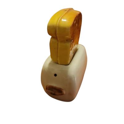 Vtg toaster with toast salt and pepper shakers