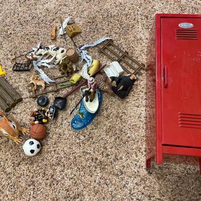 Small metal locker with plastic toys